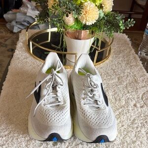 Brooks White Running Shoes with Black Logo and Blue Branding